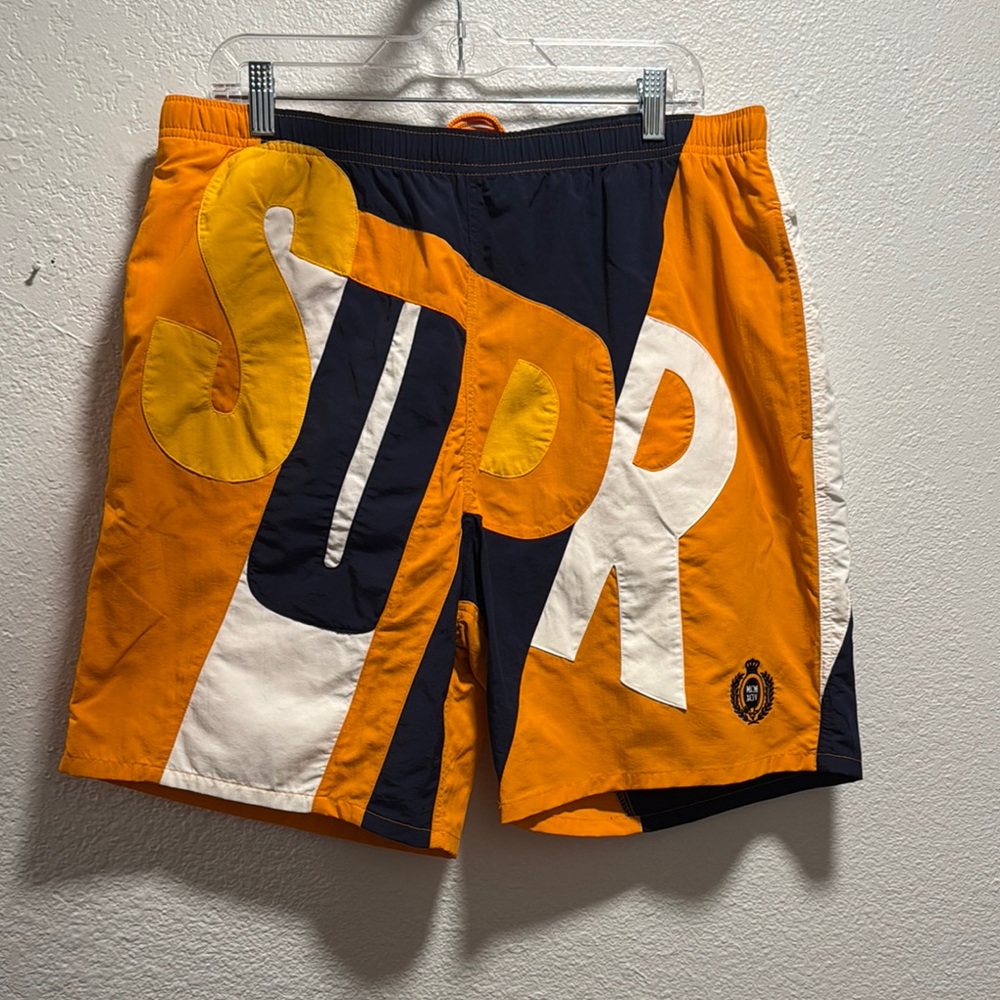Supreme Big Letter Water Board Shorts with Bold Graphic Design